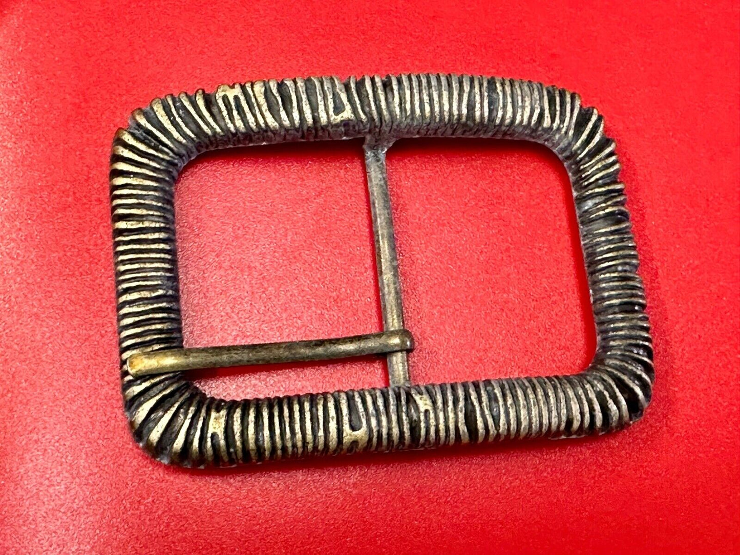 Unique Center Bar Spring abstracted wrapped style rectangular belt buckle