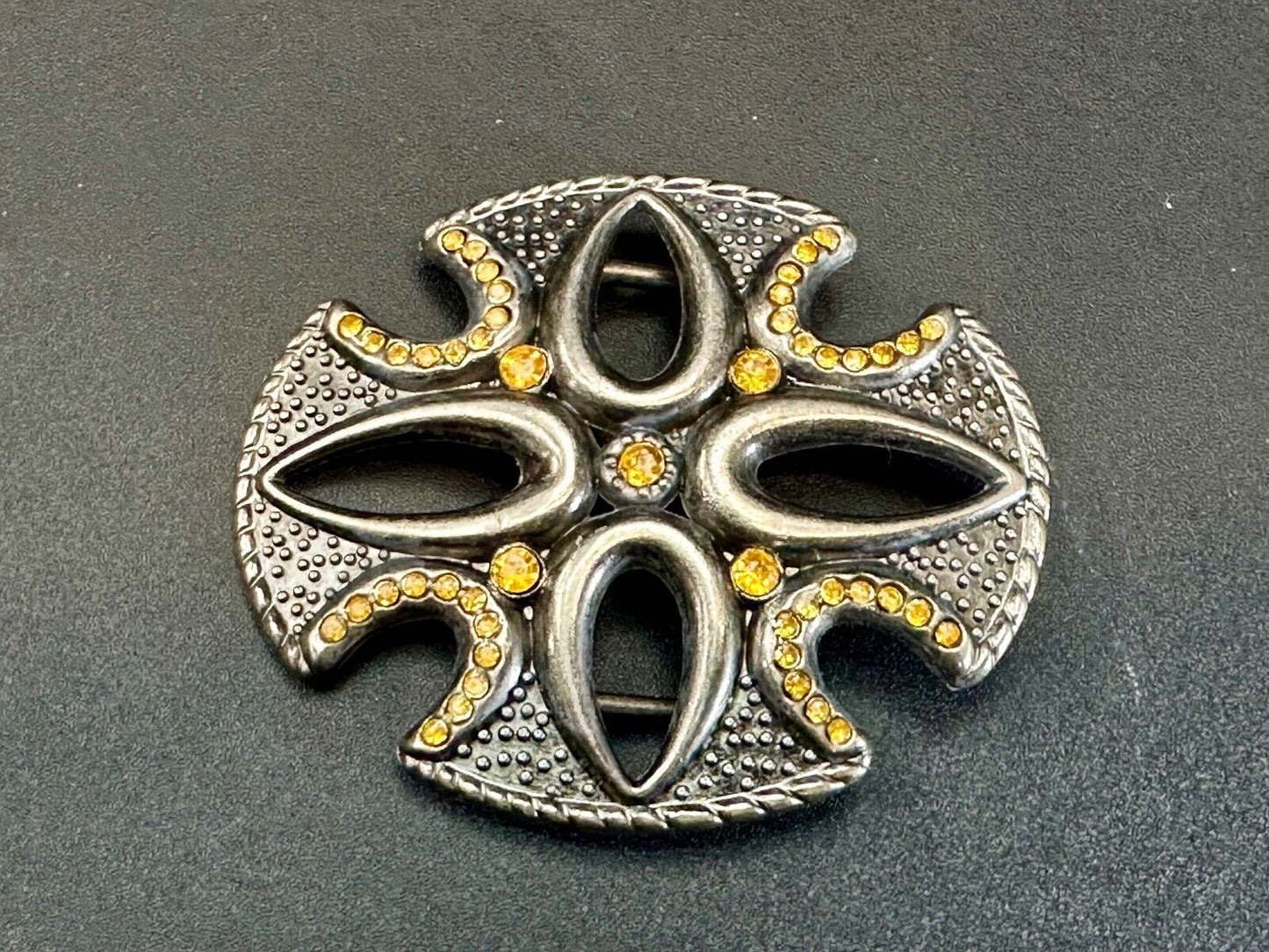 unique see through iron cross with golden brown rhinestone accents