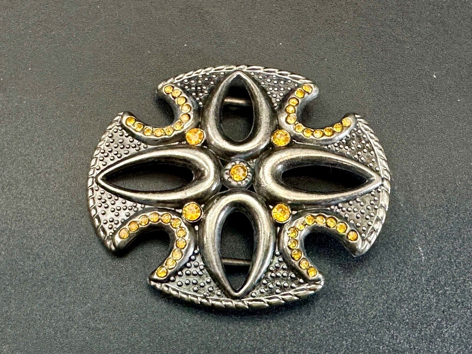 unique see through iron cross with golden brown rhinestone accents