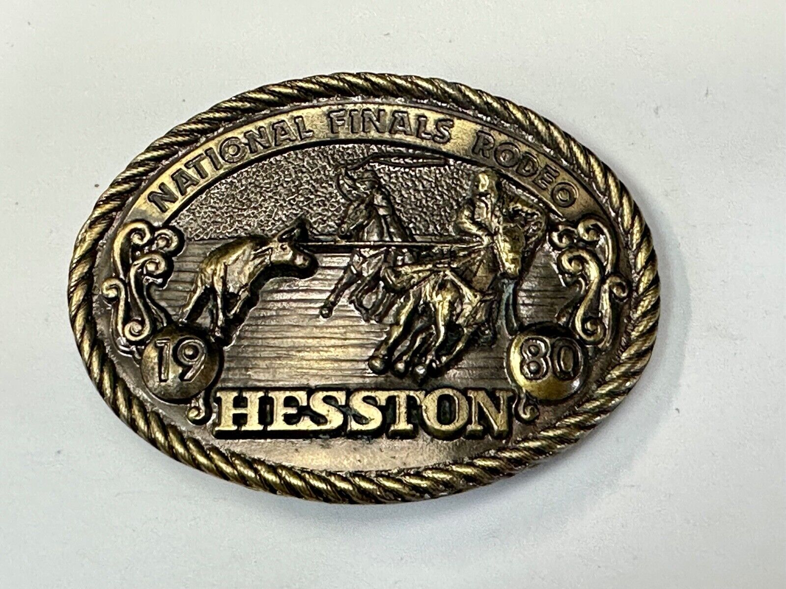 1980 NFR Rodeo Vintage Hesston Cow Roping Steer Wrestling Cowboy belt buckle