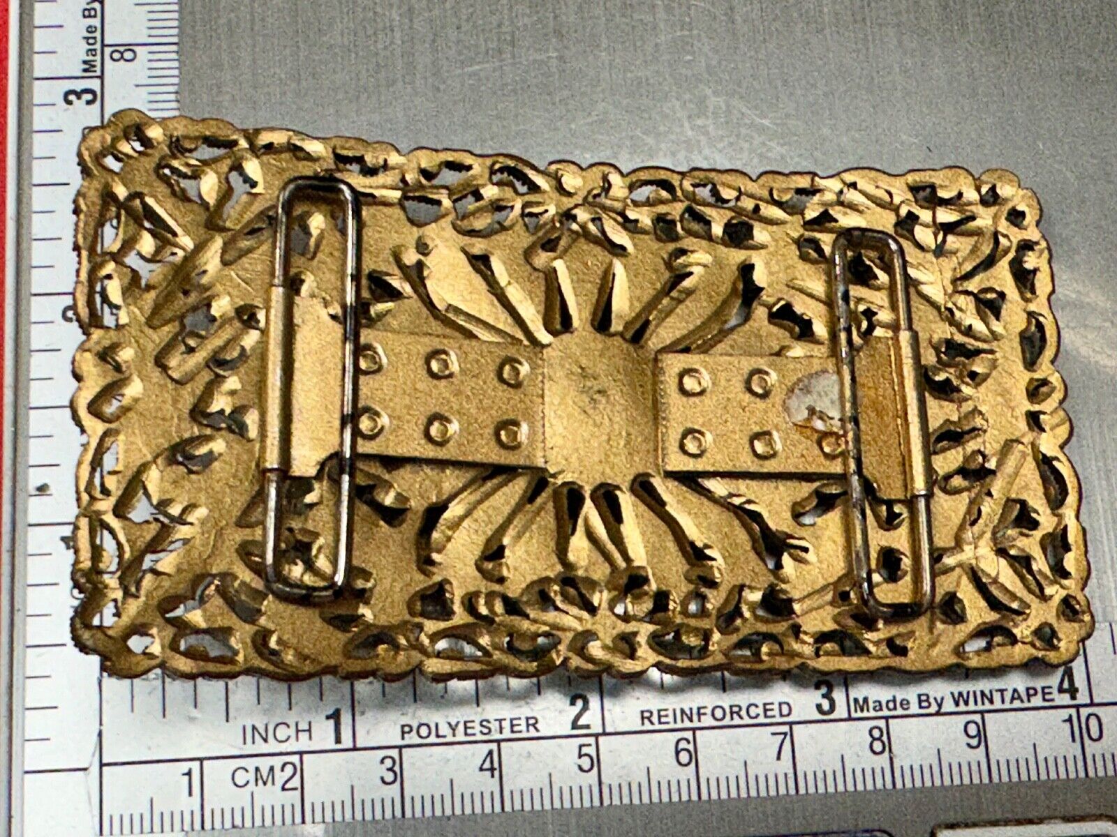 Antique gold tone? Flower theme Rhinestone covered scarf slide belt loupe buckle