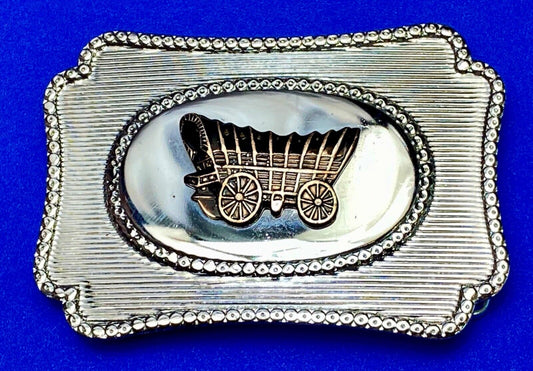 Vintage Covered wagon two tone reflective pre loved, western framed belt buckle