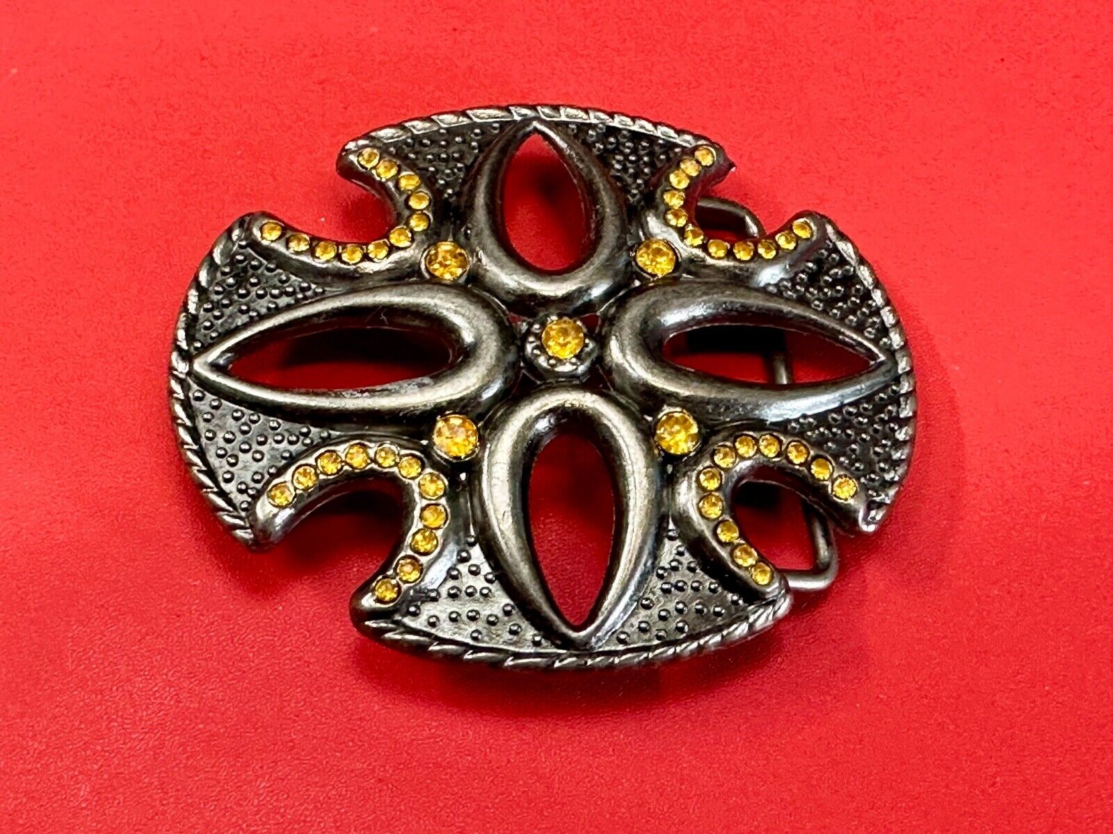 unique see through iron cross with golden brown rhinestone accents