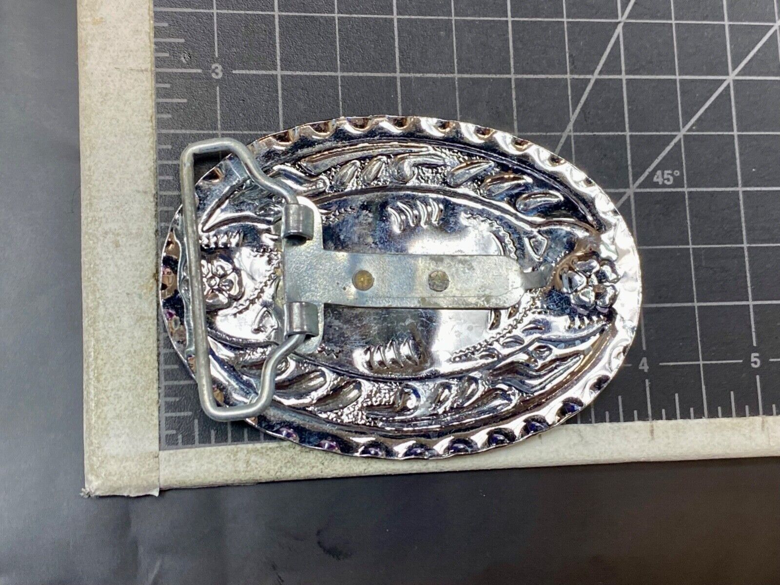 Vintage horse head through lucky horseshoe on mixed metal western belt buckle