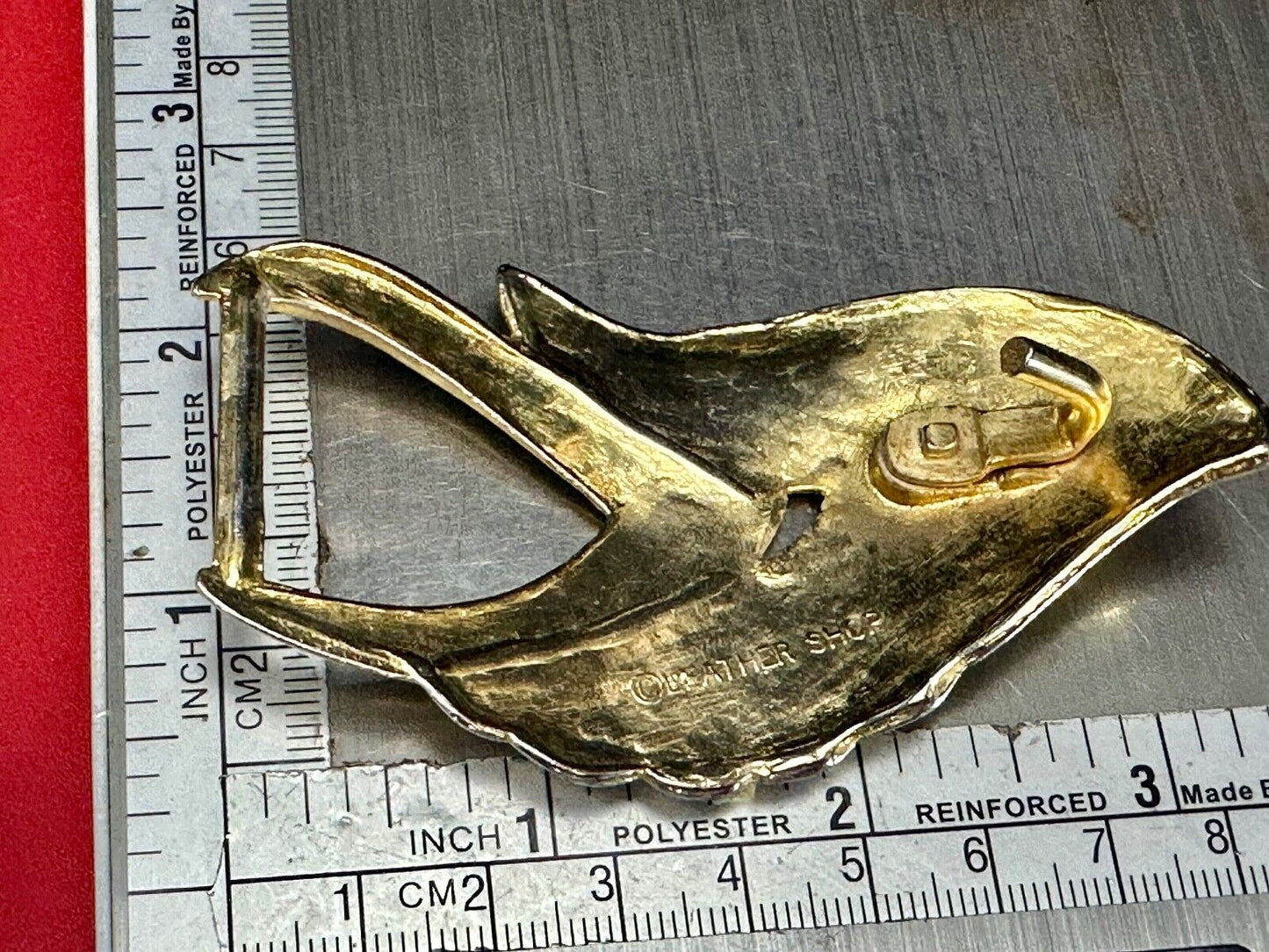 Abstract Art - Wings  gold tone belt buckle signed Leather shop