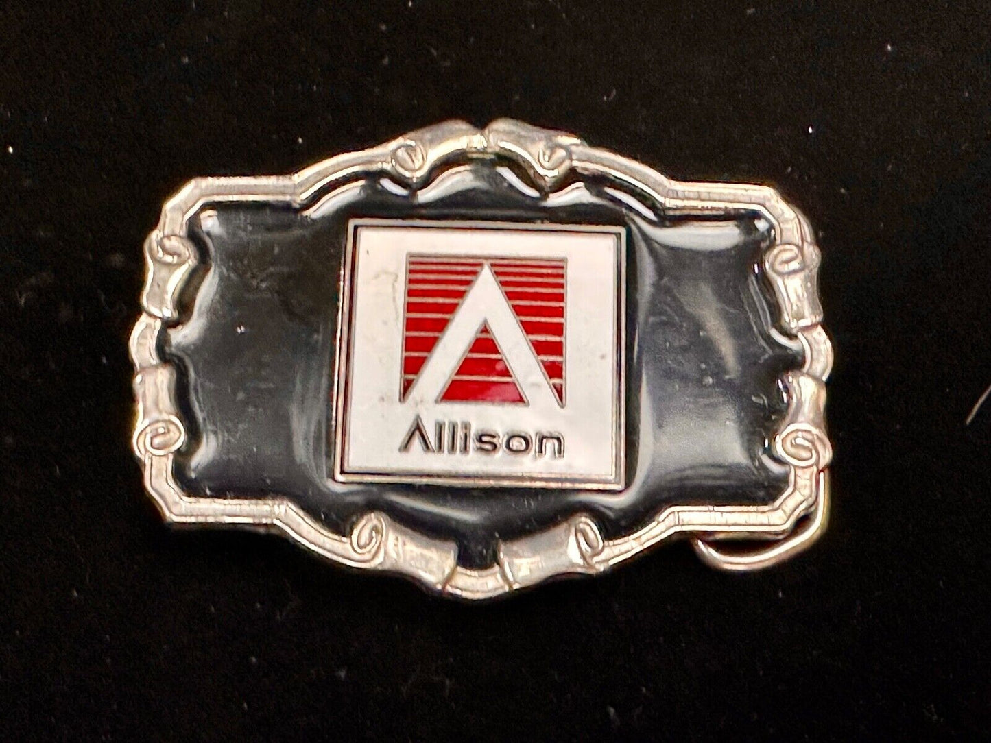 Allison Company logo emblem on western framed black enameled belt buckle