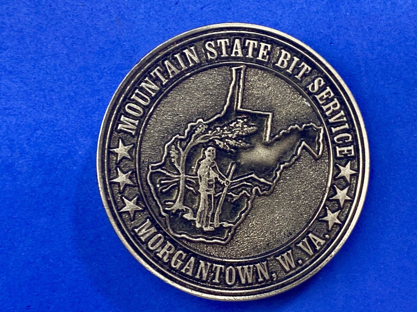 Vintage  Mountain State Bit Services Morgantown W.V. round belt buckle  by Lewis
