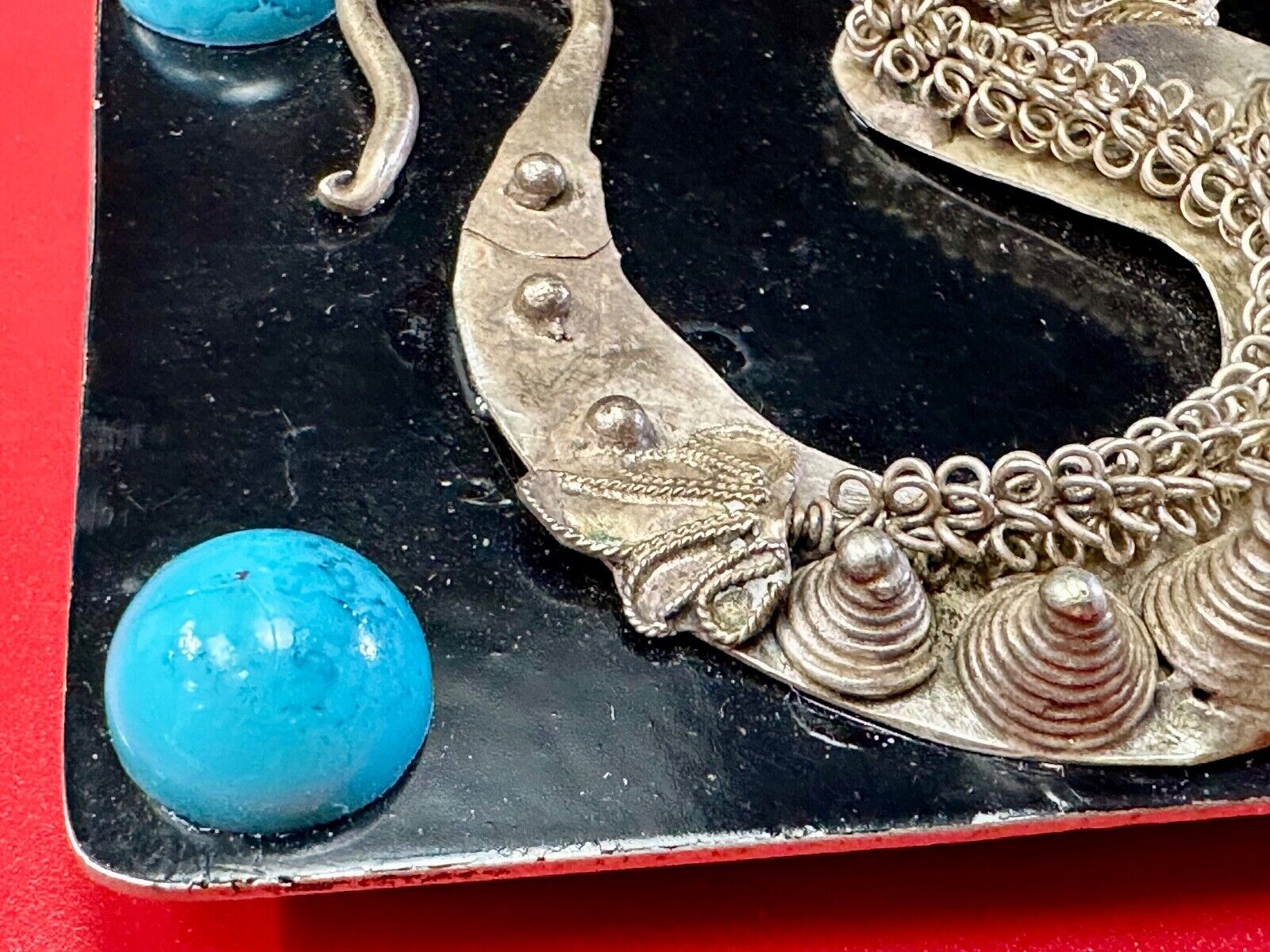 Artisan Dragon theme rectangular belt buckle with turquoise colored corner accts