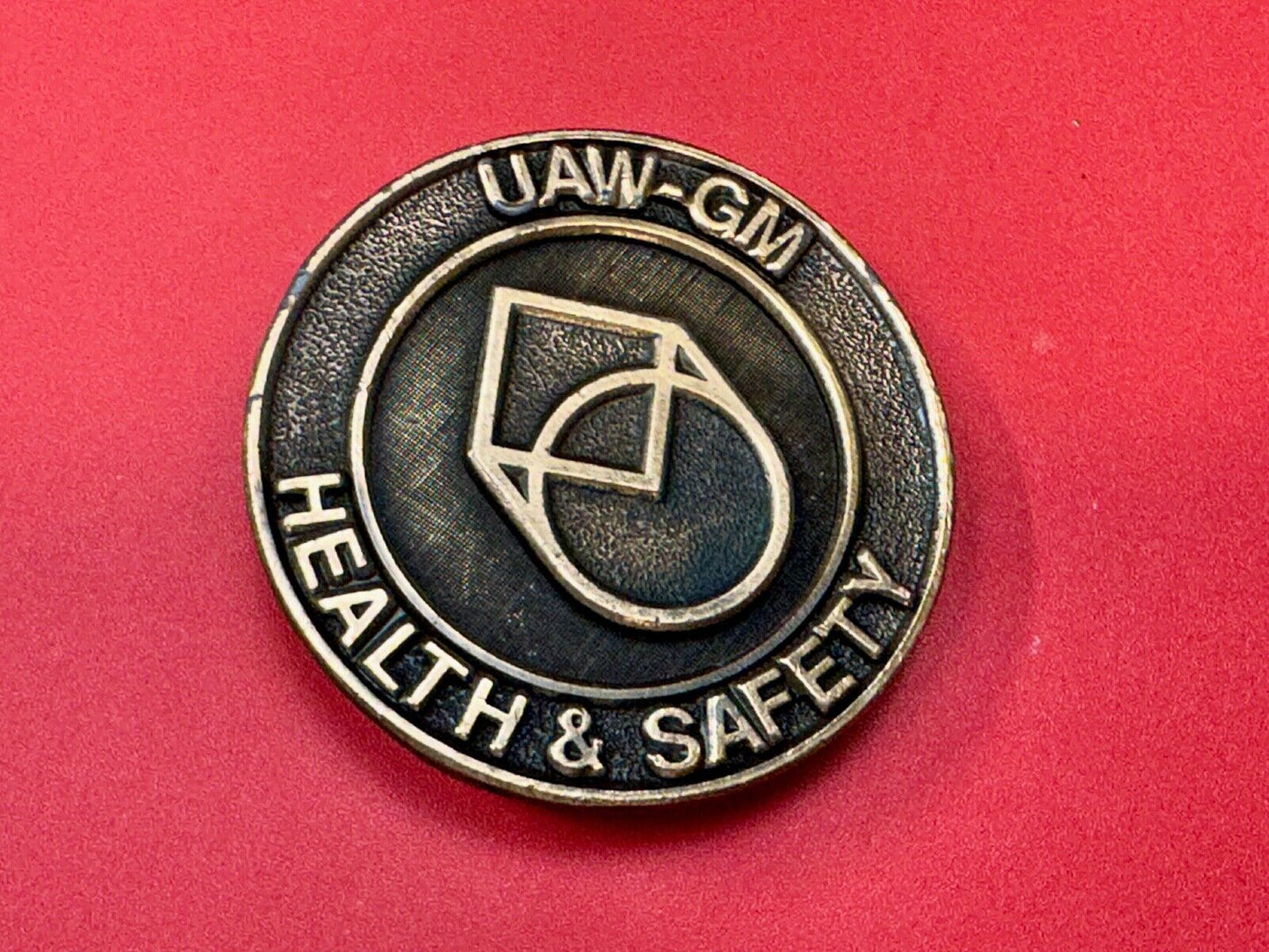 UAW-GM auto workers union round Health & Safety Award belt buckle