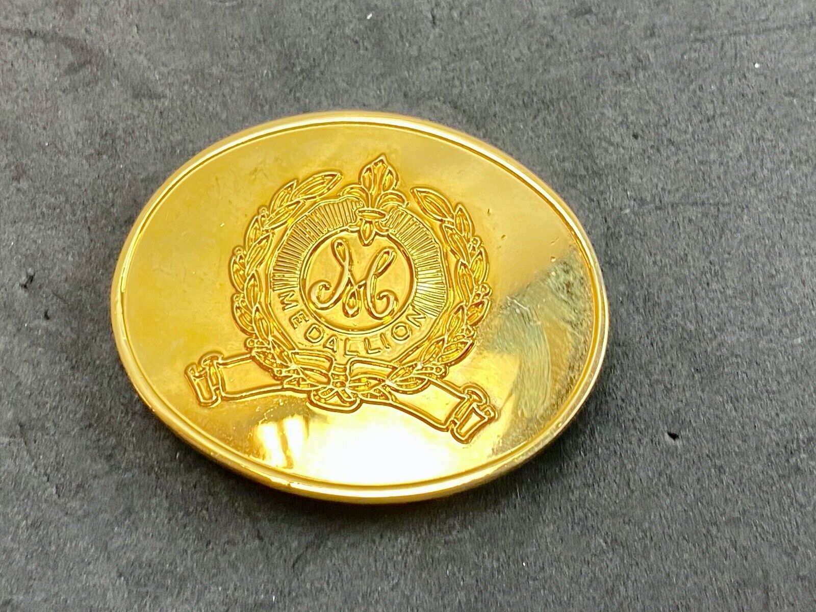 Vintage gold tone Medallion ribbon small 2"  belt buckle 