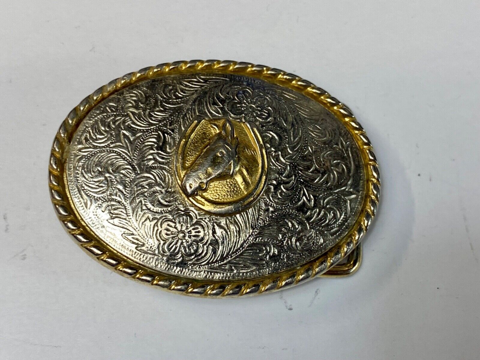 Vintage horse head inside of lucky horseshoe two toned western belt buckle
