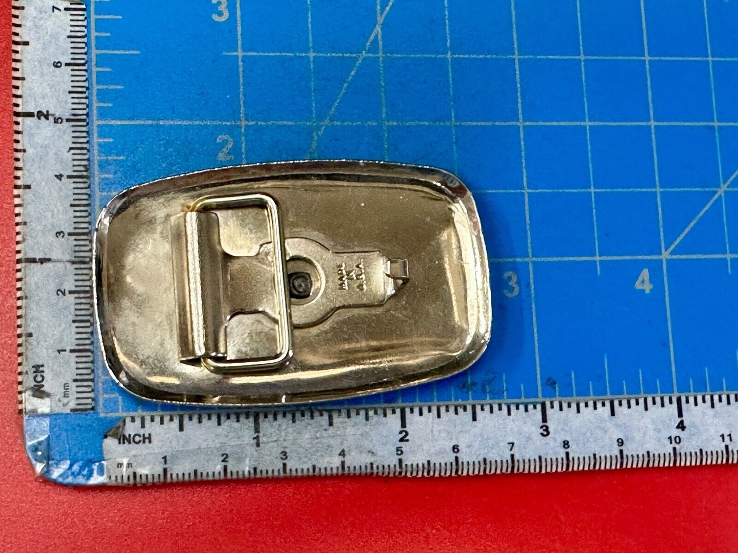70s Covered Wagon two tone reflective rounded corner USA made belt buckle