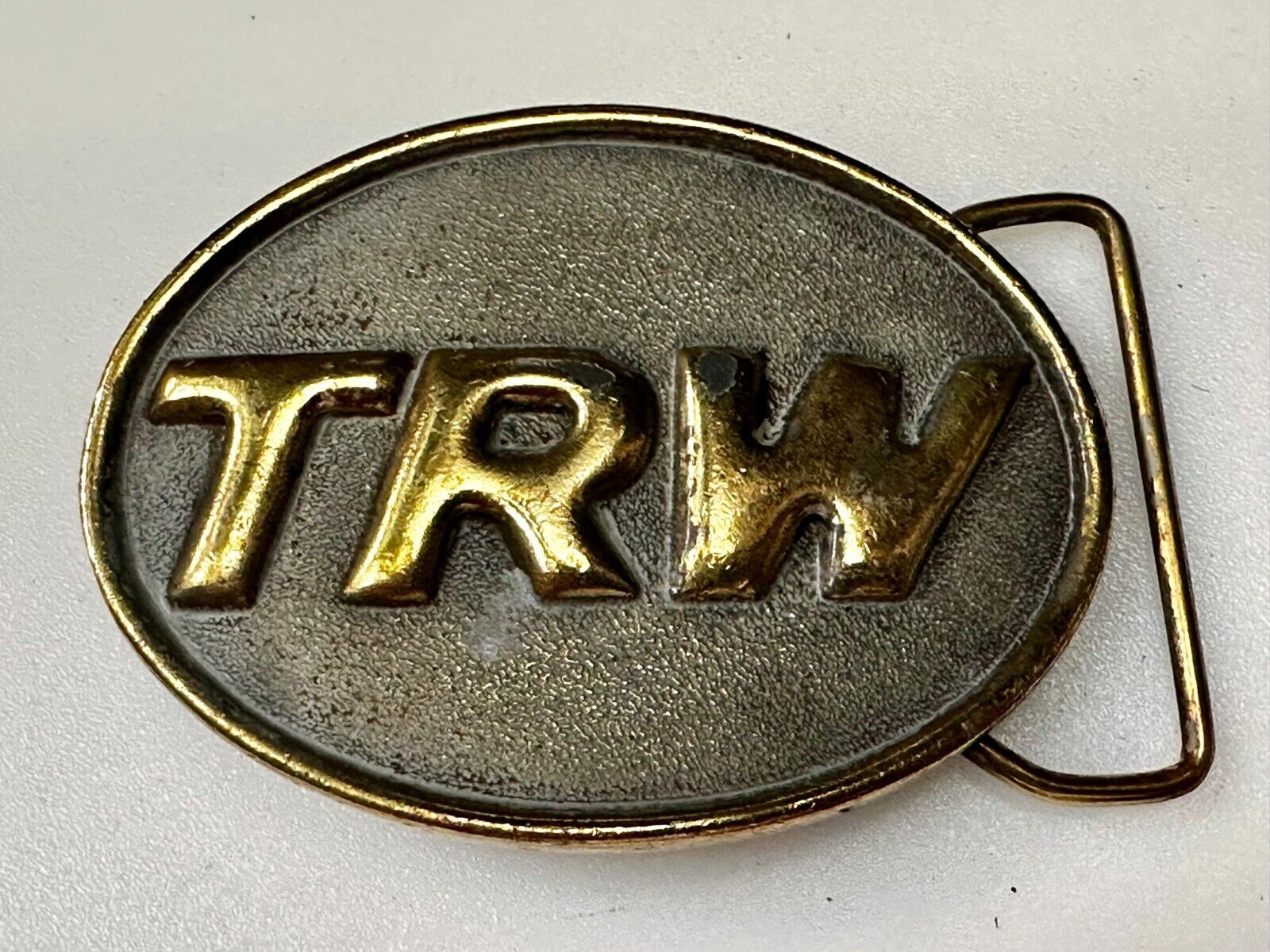 TRW Automotive Parts Advertising Vintage Belt Buckle by Indiana Metal Craft
