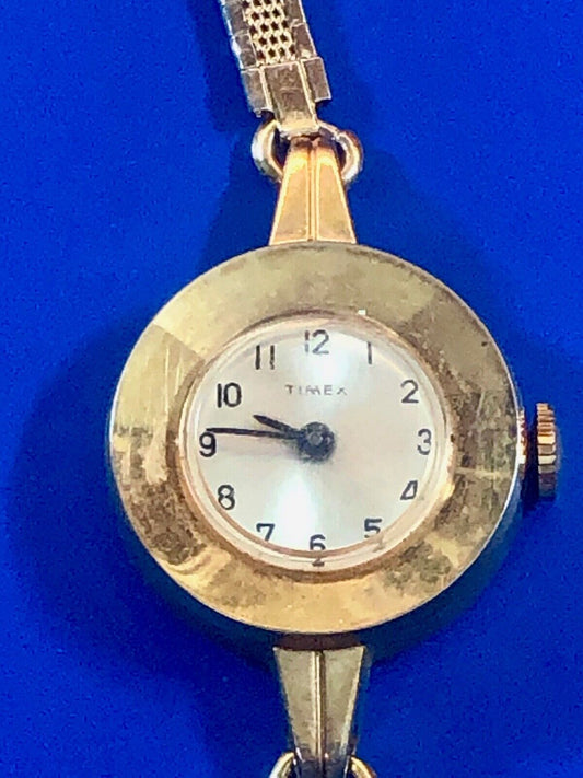 Timex Vintage Gold tone Disc Circular retro woman’s wind up watch