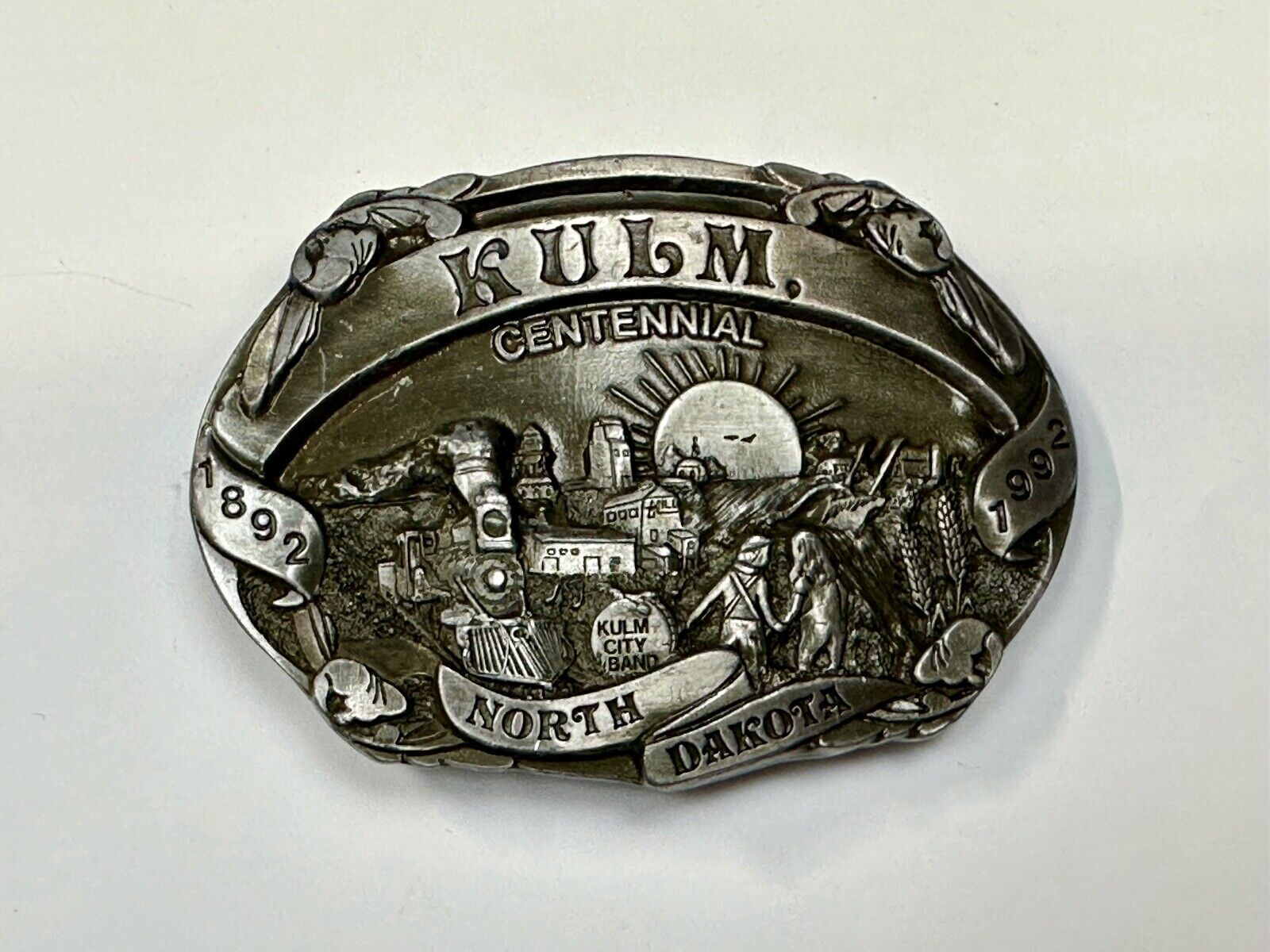 Vintage KULM North Dakota commemorative belt buckle by DART inc.