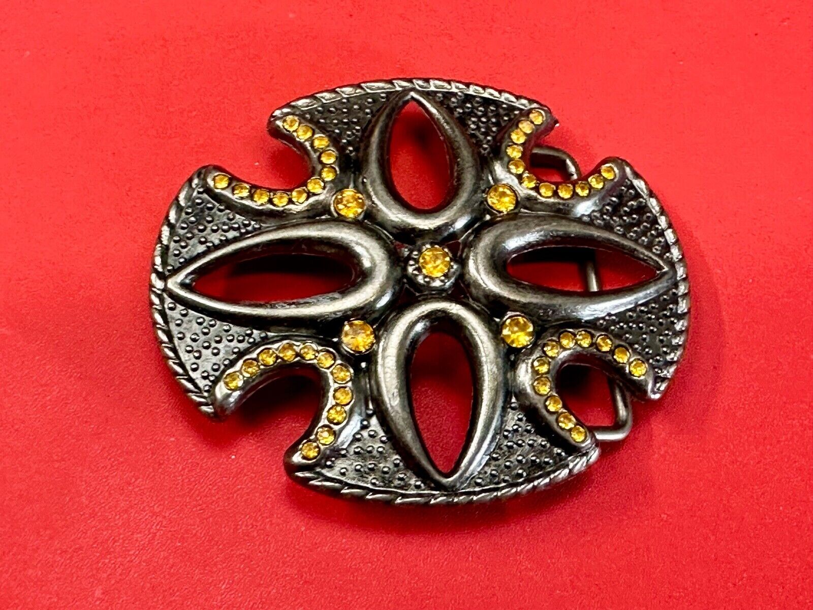 unique see through iron cross with golden brown rhinestone accents