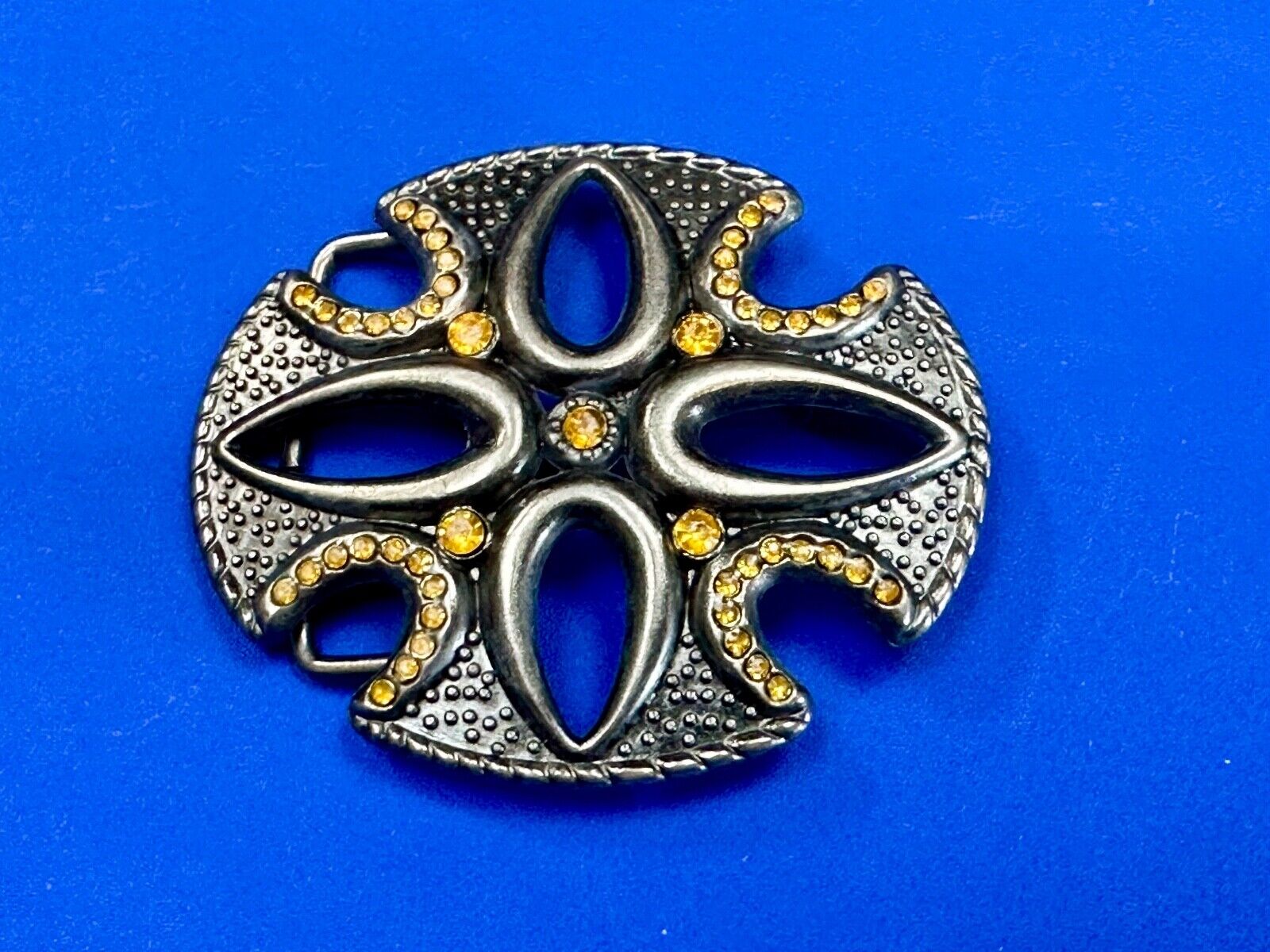 unique see through iron cross with golden brown rhinestone accents