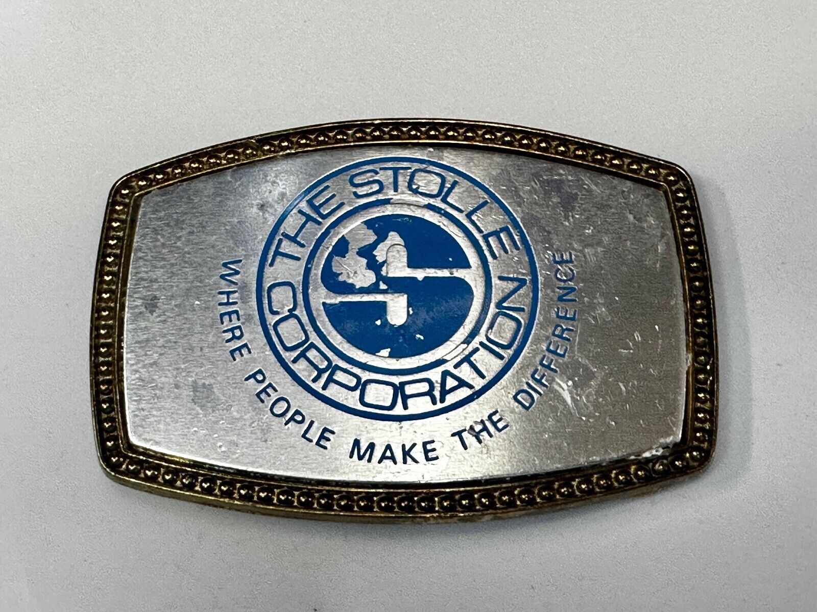 The Stolle Corporation Where People Make The Difference Alumaline Belt Buckle