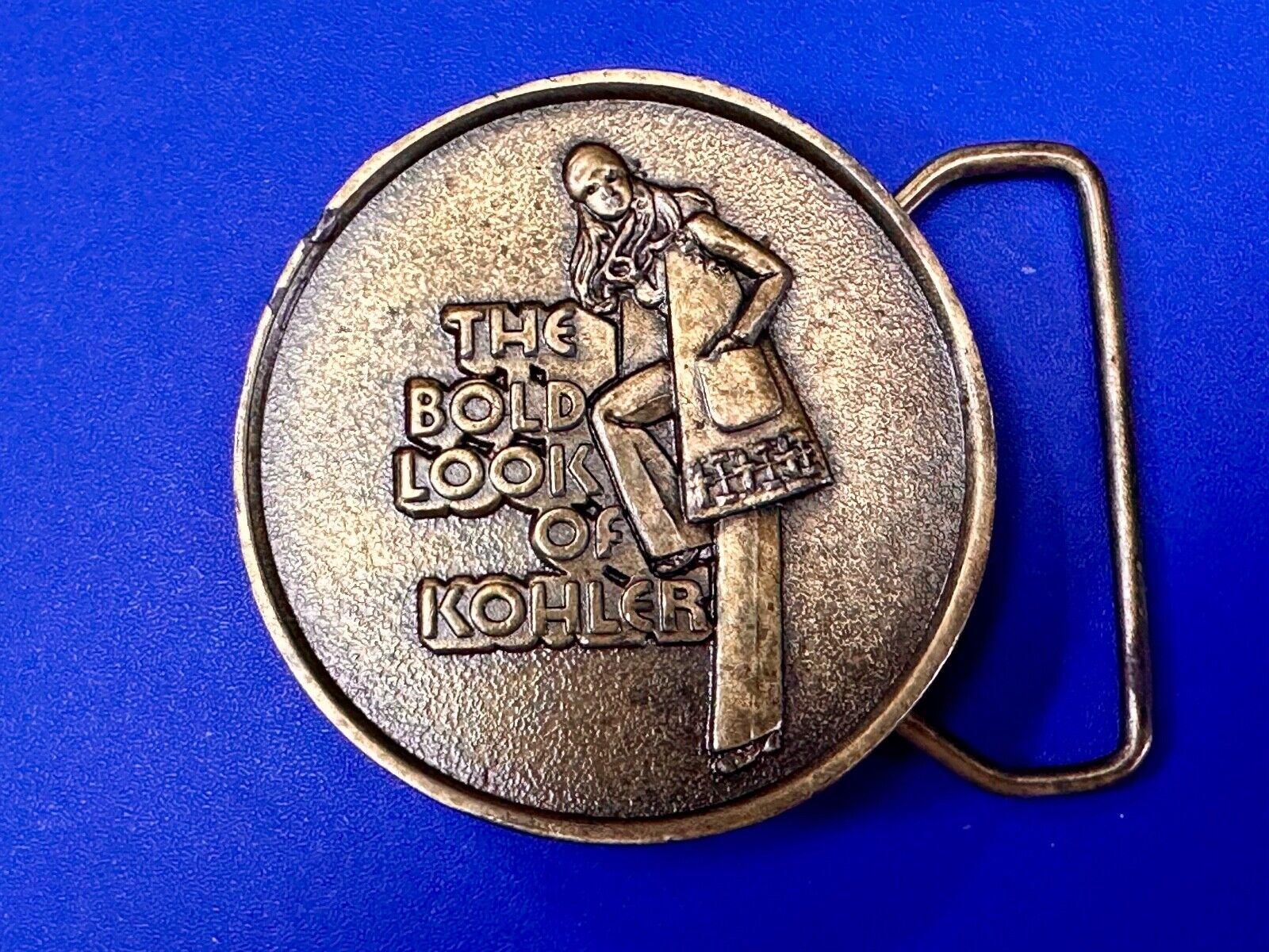 The Bold Look of Kohler Vintage 1977 Lewis round Limited Edition belt buckle