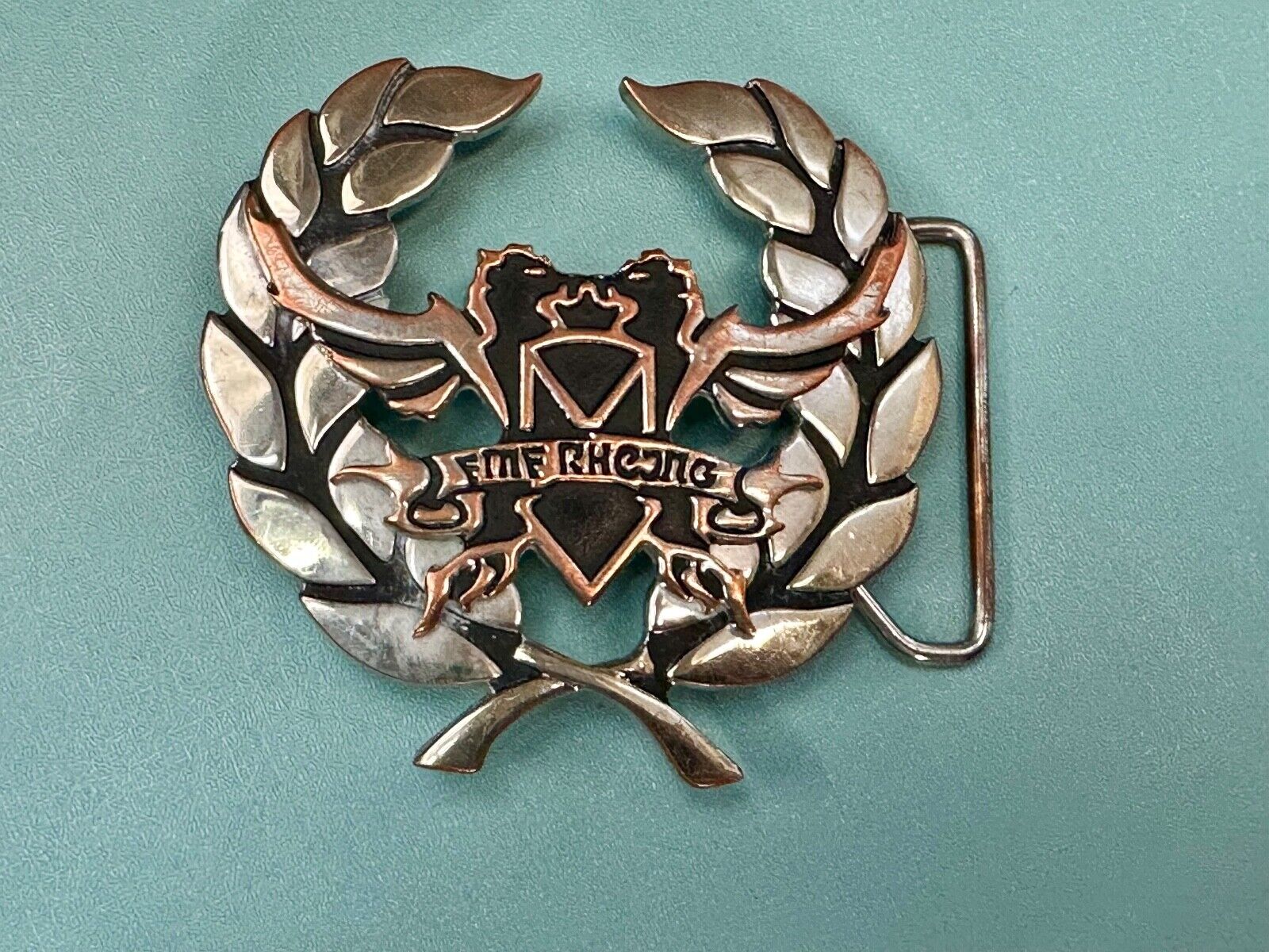 Two griffins?  FME RheJNG Olive branch cutout belt buckle