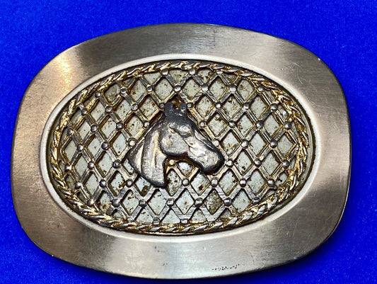 Vintage Horse head centered over wire mesh pattern on silver color belt buckle