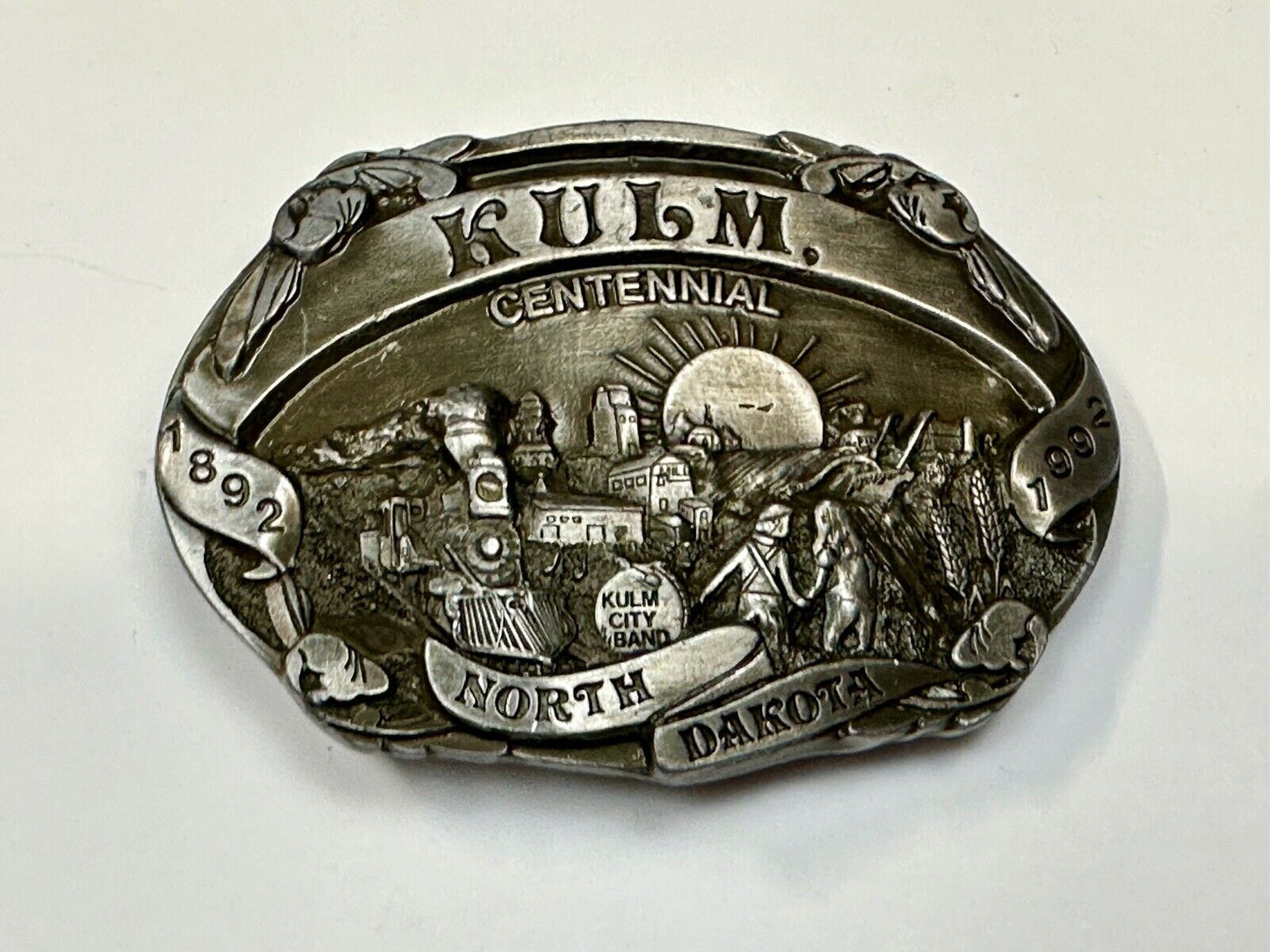 Vintage KULM North Dakota commemorative belt buckle by DART inc.