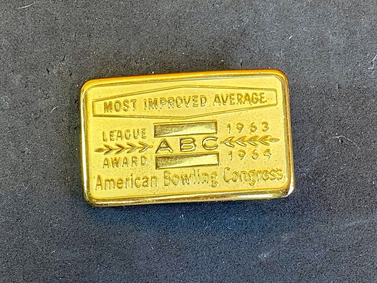 1963, 64 American Bowling Congress Most Improved Average Award Belt Buckle