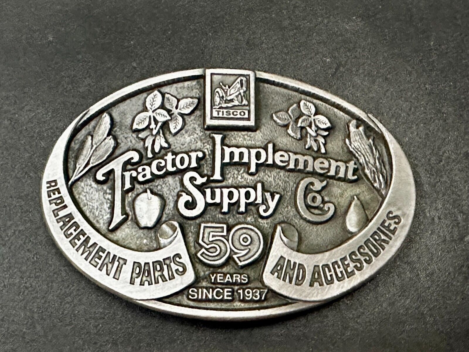 59 Years TISCO Tractor Implement Supply company Belt Buckle by Speccast