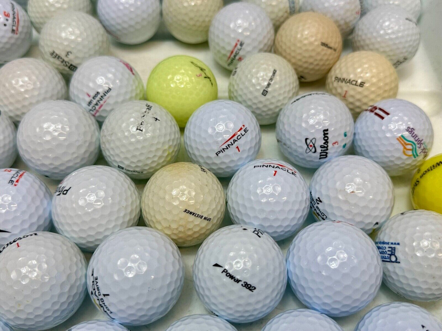 73 pc Used Golf Ball Lot. - Mostly Wilson Pinnacle