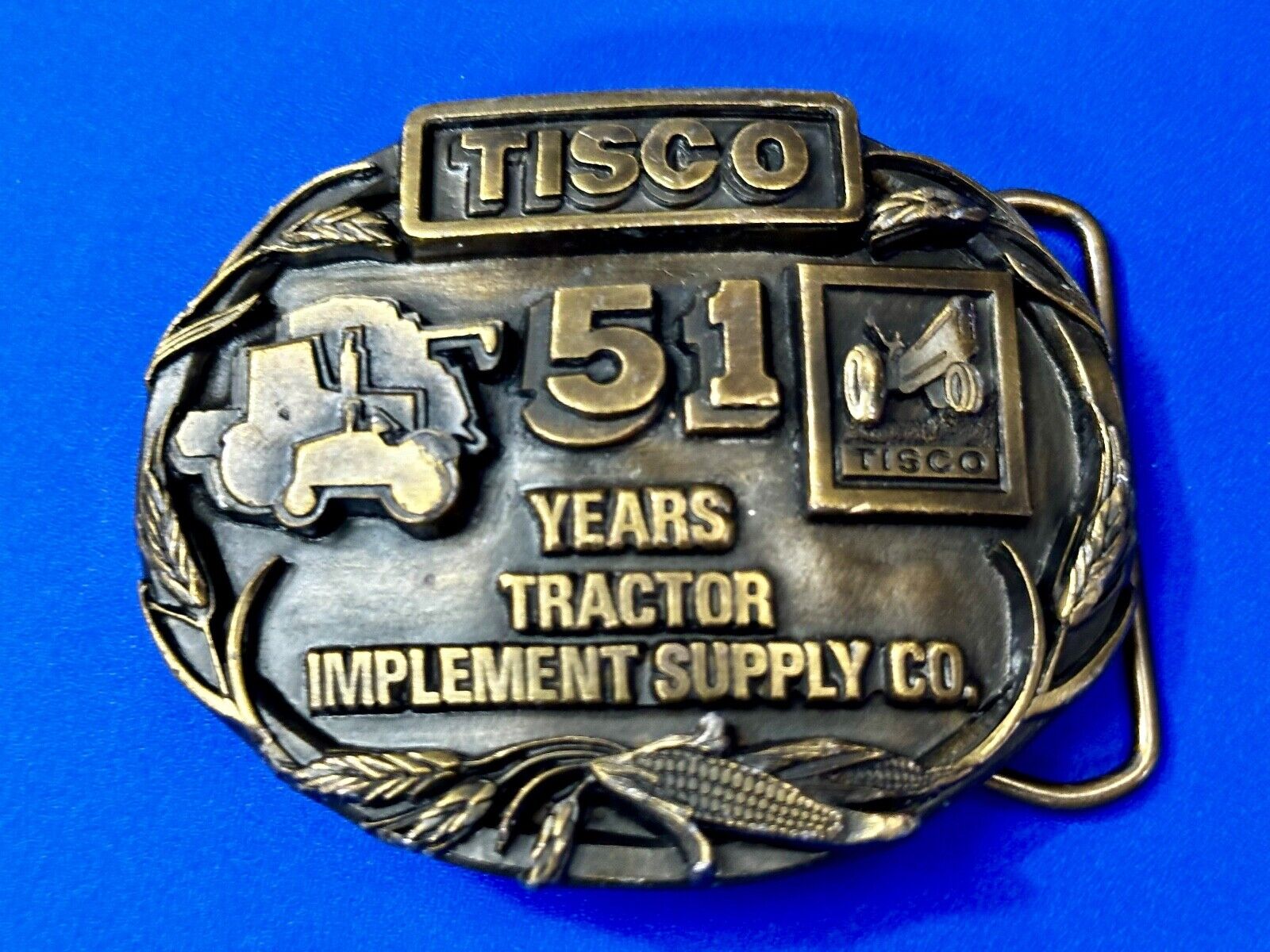TISCO 51 Years Tractor Implement Supply Co. Belt Buckle Vintage 1987 by Siskiyou