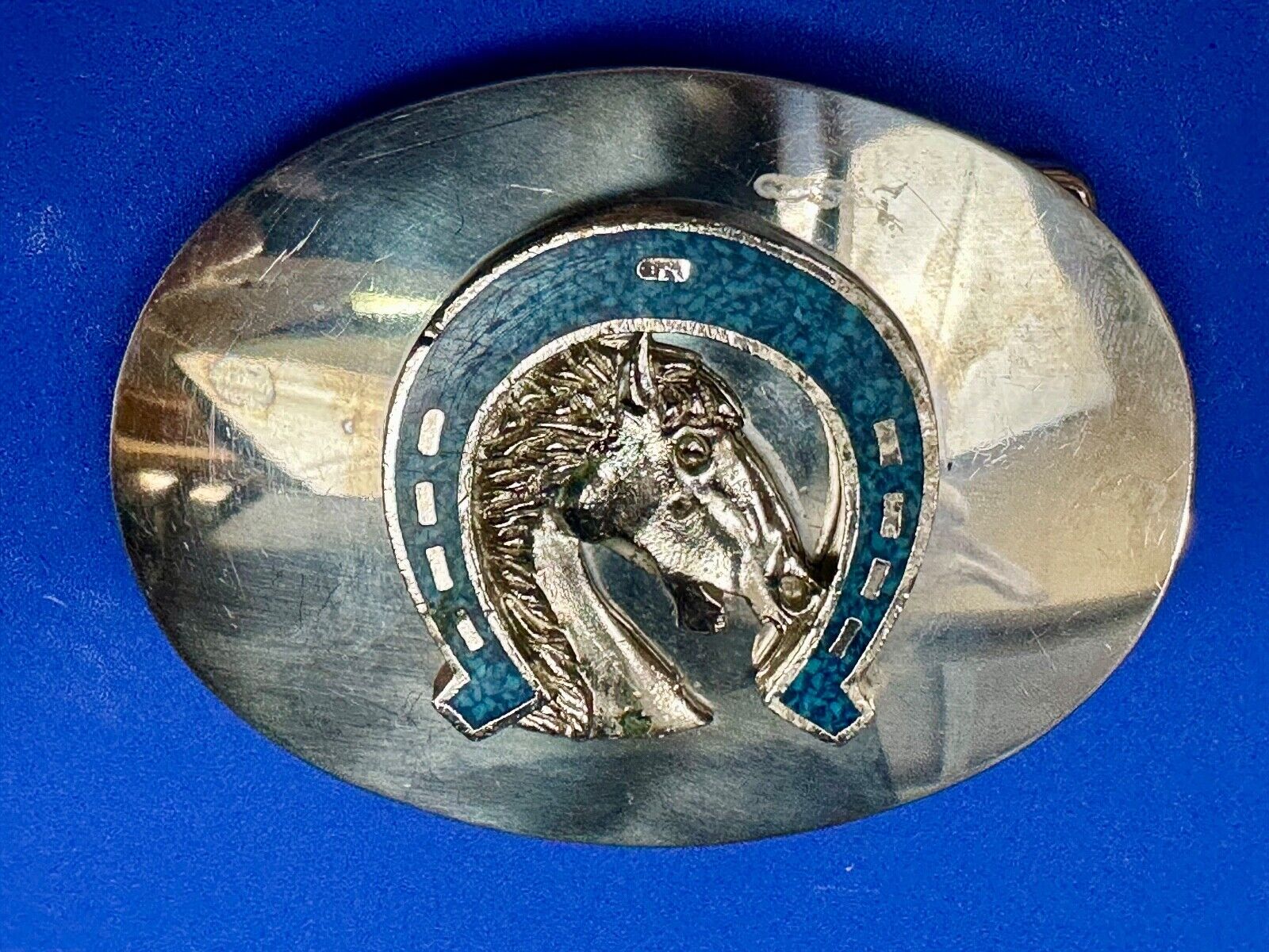 Vintage horse head bust in turquoise chip horseshoe on western belt buckle