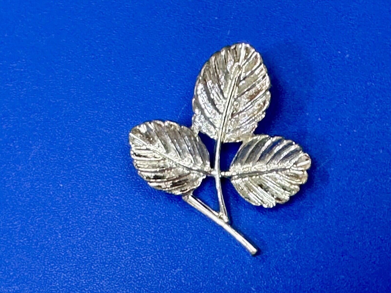 Three Leaf cutout Sarah Coventry signed silver tone brooch pin