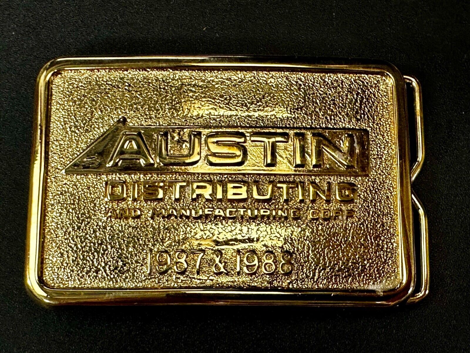 Austin Texas Distributing and Manufacturing 1987 - 1988 Gold Tone Belt Buckle