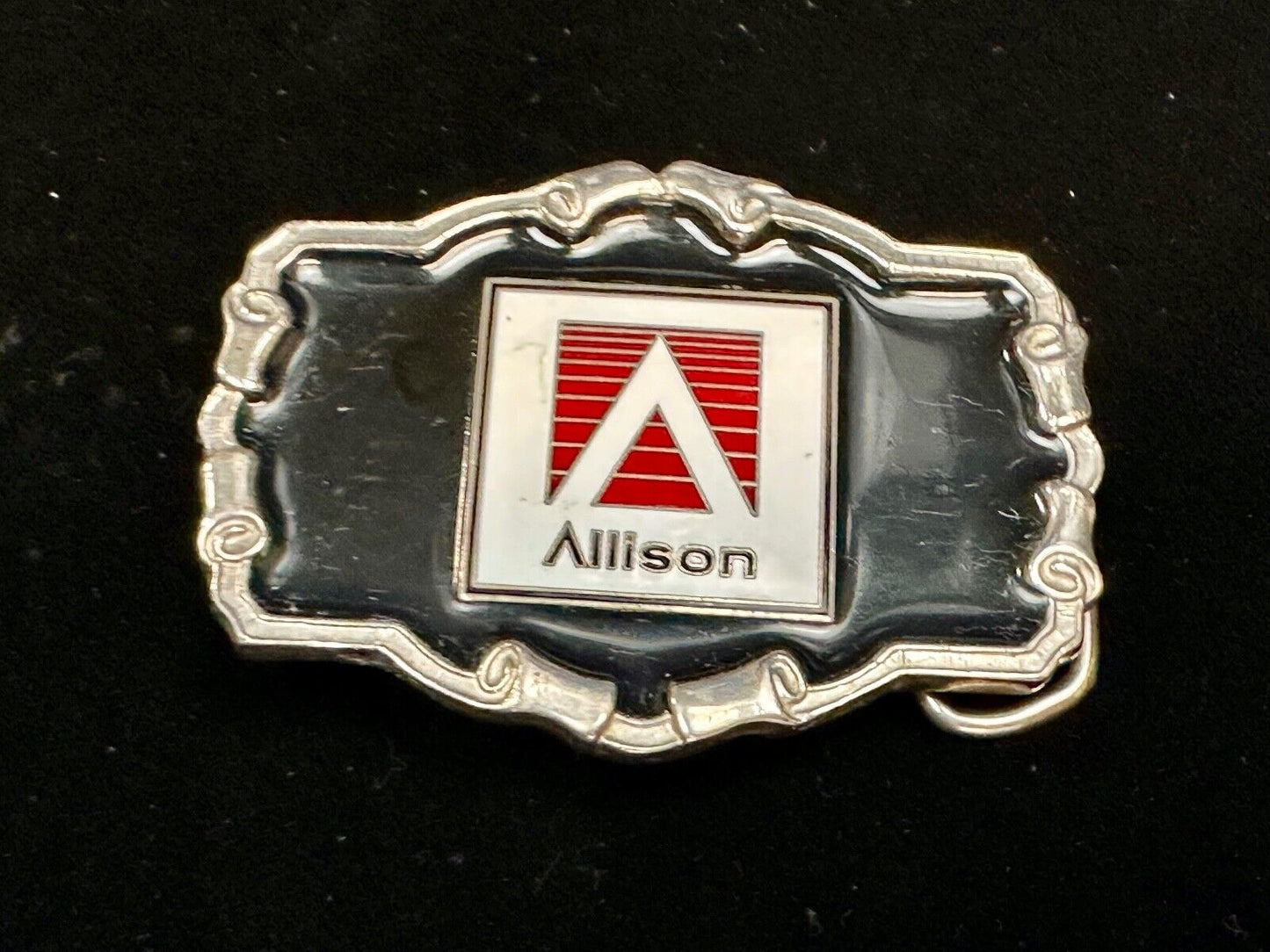 Allison Company logo emblem on western framed black enameled belt buckle
