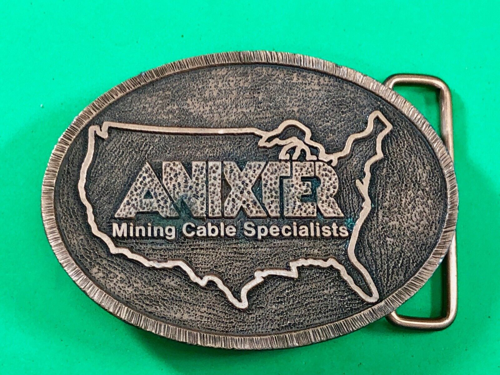 Anixter Mining Cable Specialists company promotional belt buckle by Hit Line 