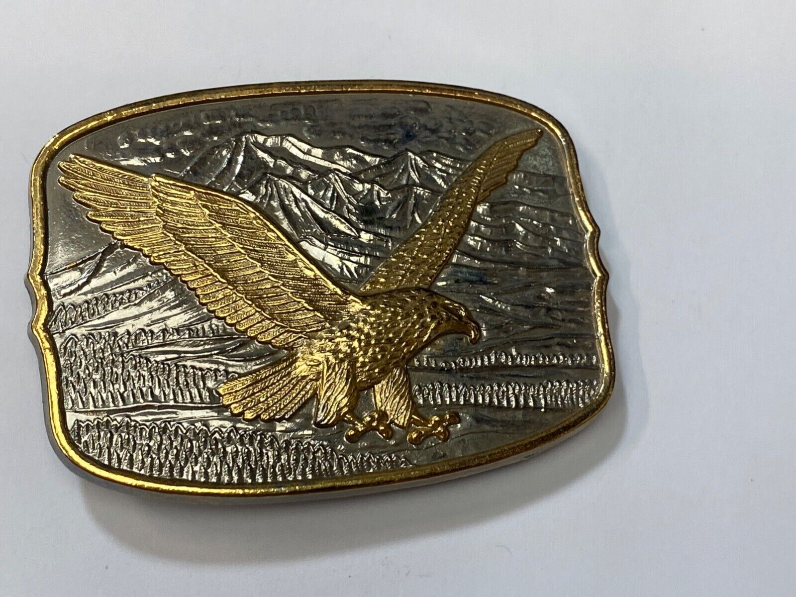 AMERICAN EAGLE Majestically hunting flying over mountains Numbered belt buckle