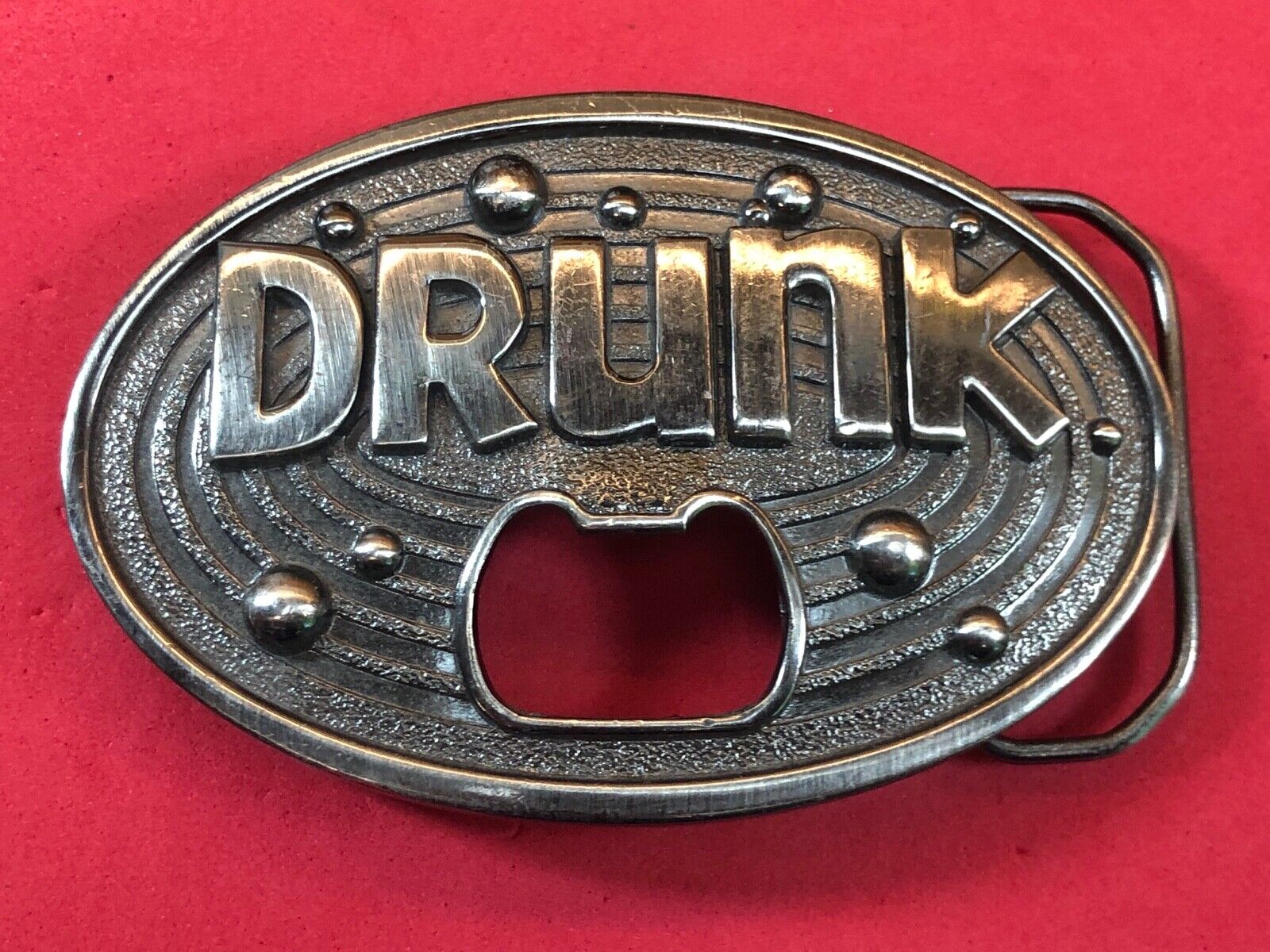 vintage large metal Bottle Opener / belt buckle - words DRUNK   Beer glass party