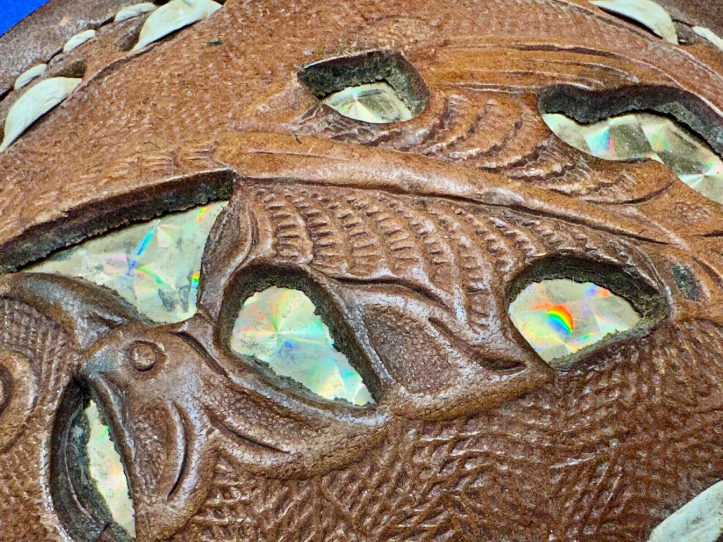 Unique leaf pattern in leather belt buckle made of Abalone shell